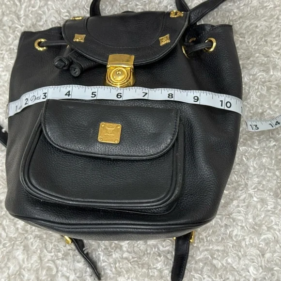 MCM Black Leather Backpack with Gold Accents - Picture 10 of 15